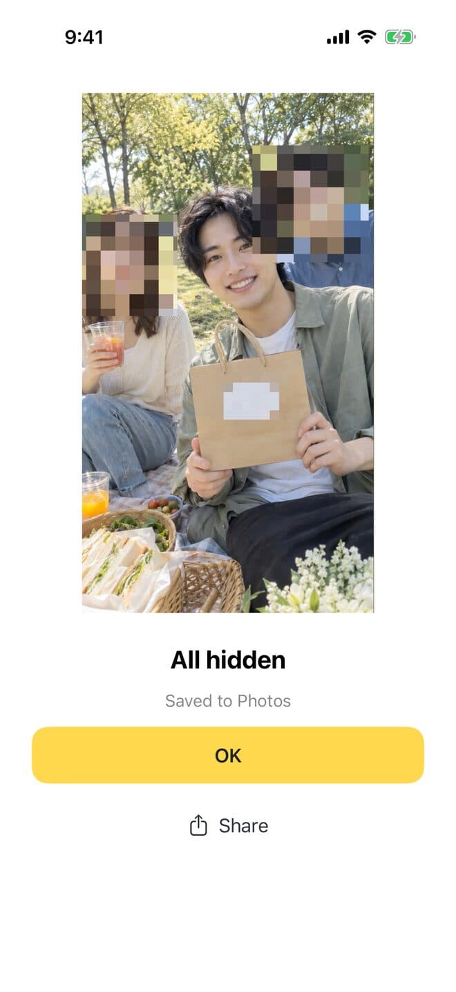The finished screen: “All hidden — Saved to Photos”
